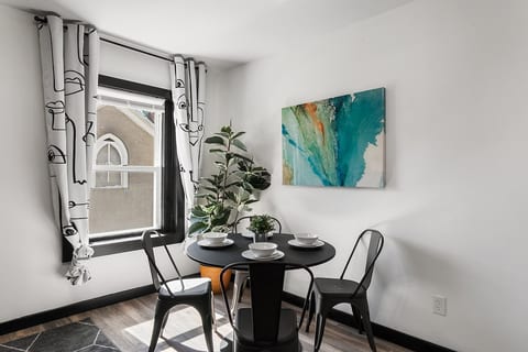 ️ Sunlit Dining Space | A cozy, artful nook where natural light and inspiring décor create the perfect setting for every meal.