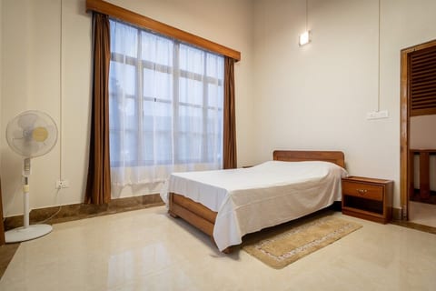 Cosy bedrooms with very high ceiling.
