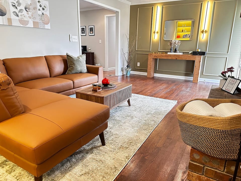 Beautiful living room with a comfortable leather couch!