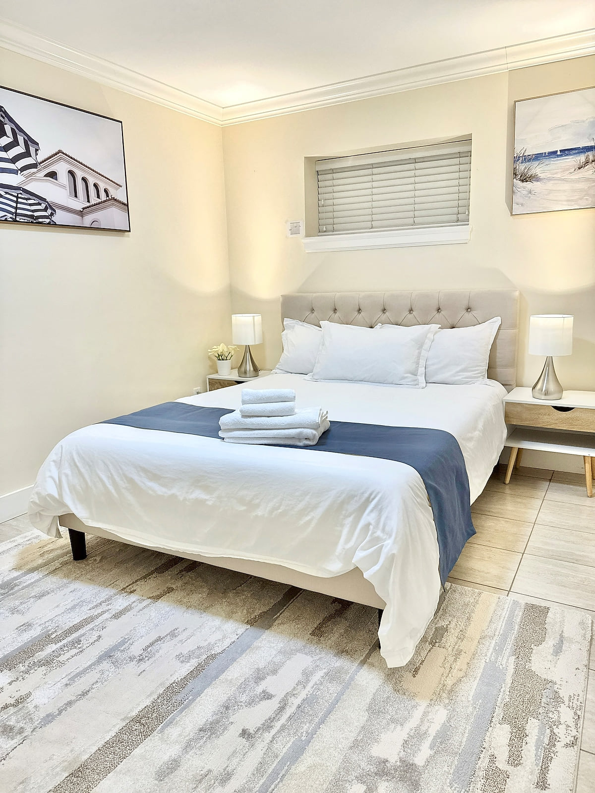 This gorgeous bedroom with a comfy Queen size matteress and superior quality bedding, only for your sound sleep.