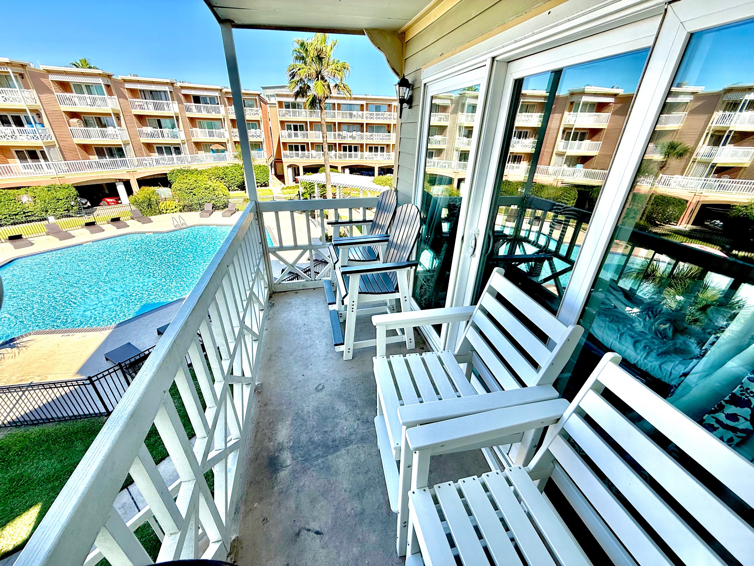 4 tall Aidrondack chairs to bask in ocean and beach views!