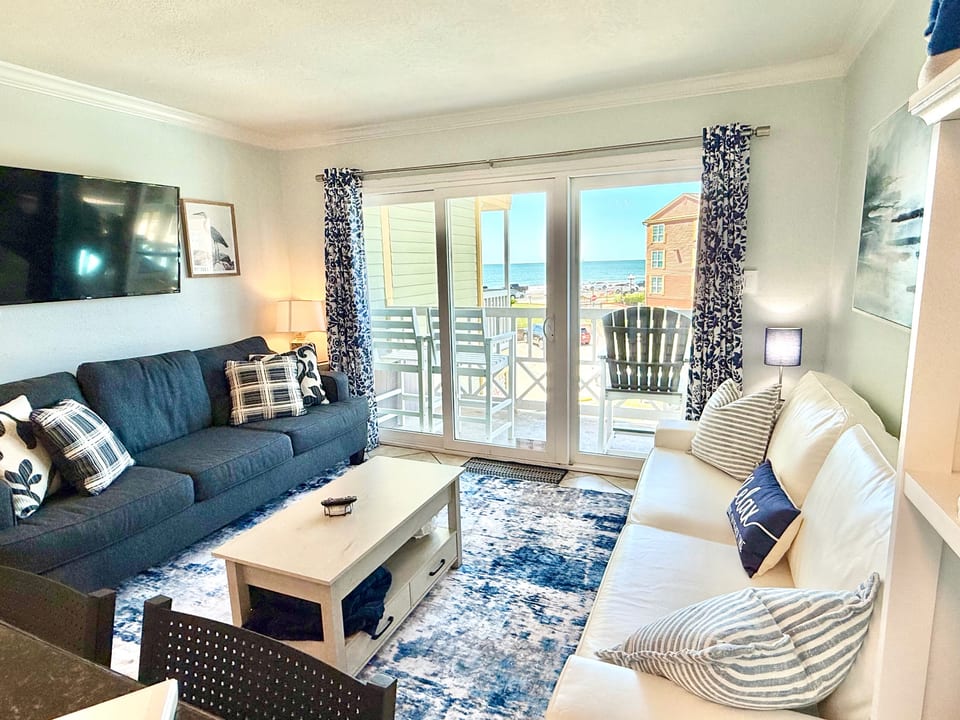 2 Sofas with 1 having a pull out Queen bed to support up to 6 max staying there. Effortless ocean views from inside the property.