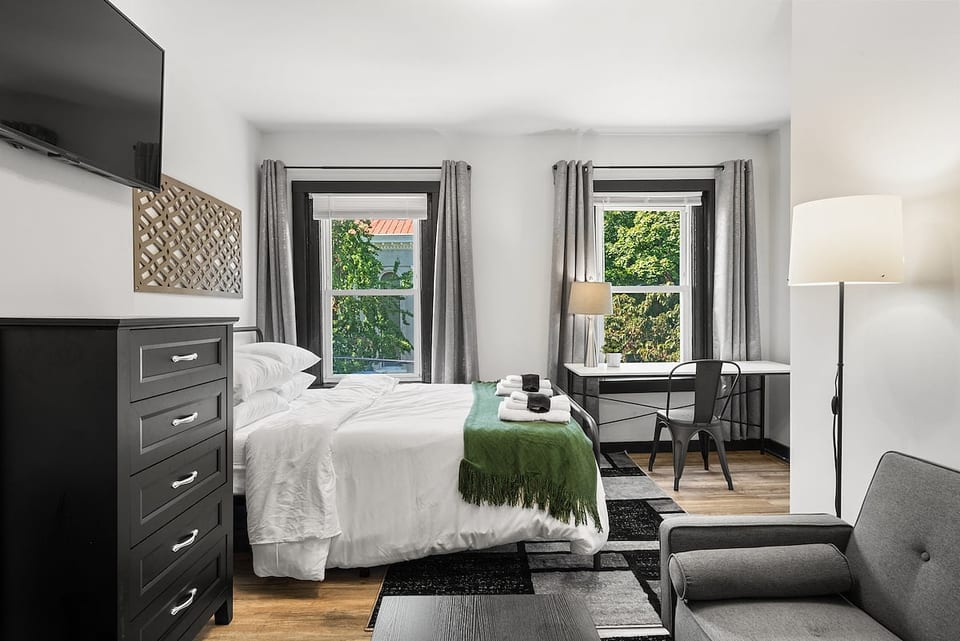 Relax and recharge in our Bedroom with TV – a sanctuary perfect for long-term stays! Indulge in your favorite shows and unwind after a day of adventures. Designed for extended comfort, our space is your home away from home.