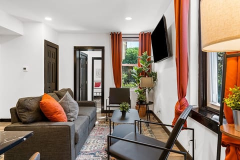 A living room that feels just like home – only better! Designed for extended stays, it's where stories are shared and memories are made. Your long-term comfort starts here. #HomeAwayForLonger