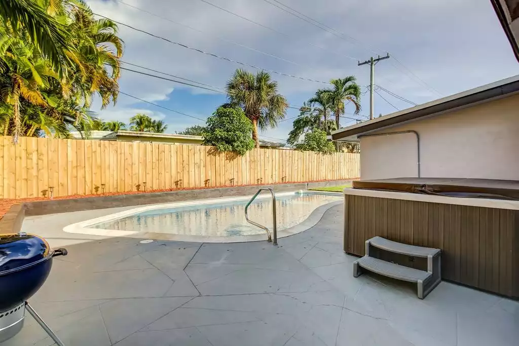 Enjoy our Poolside Hot Tub and BBQ grill