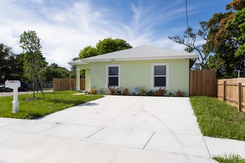 Front entrance of home with 2 car parking