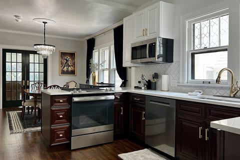 Fully renovated kitchen with modern appliances, classic details, and everything needed for cooking meals and morning coffee.
