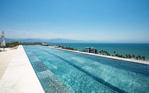 Unwind on one of Bucerías’ premier rooftops, where panoramic ocean views and a stunning infinity pool create the perfect setting for unforgettable sunsets.