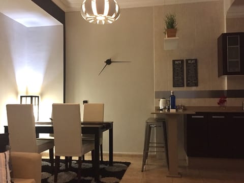 A part of iving /dining room at nightime