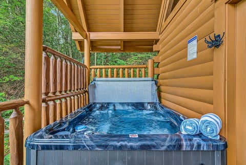 Private covered hot tub with peaceful wooded views