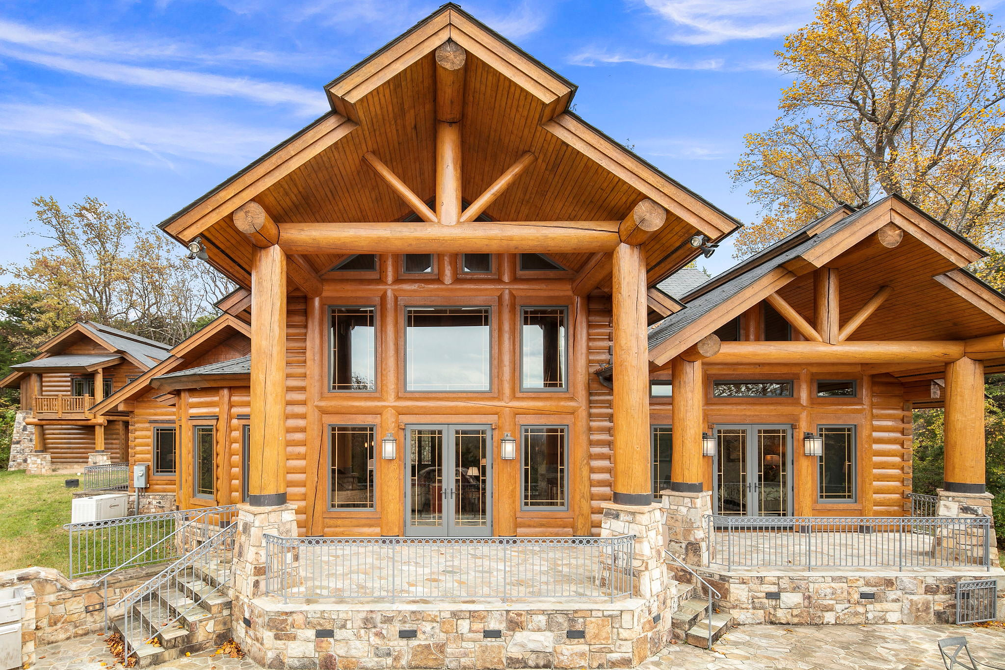 Covered rear patio with high windows, massive room for get-togethers