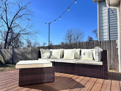 Deck with views to Harrison Park. Occasionally you will see people and pets walking around the park