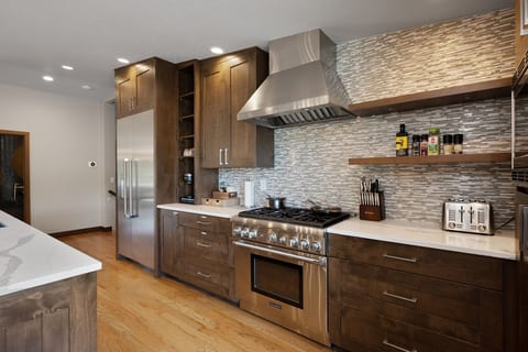 Modern chef’s kitchen with premium appliances and sleek designer finishes