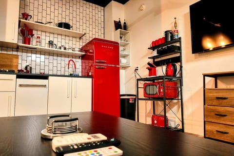 Kitchenette features full retro refrigerator