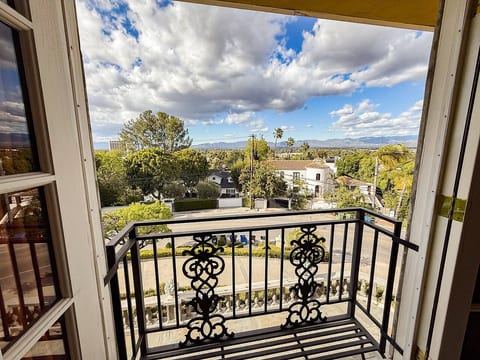 Wake up to sweeping valley views from your private Juliet balcony. Whether it’s morning coffee or sunset skies, this elevated outlook brings nature and charm right into the bedroom.