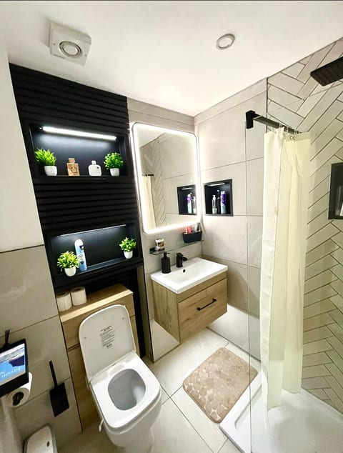 Fresh, modern bathroom with walk-in shower