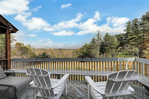 View from back deck.  There is also a gas grill and a gas fireplace on this part of the deck plus flowers in the warmer months.