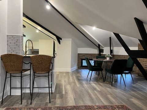 From the stairs to the kitchen.