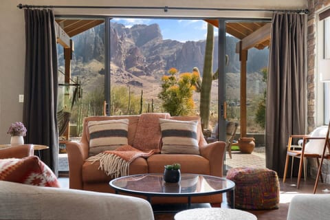 Experience the ultimate Superstition Mountain views right from the living room. This is a one of a kind experience, you wont see anything like it!