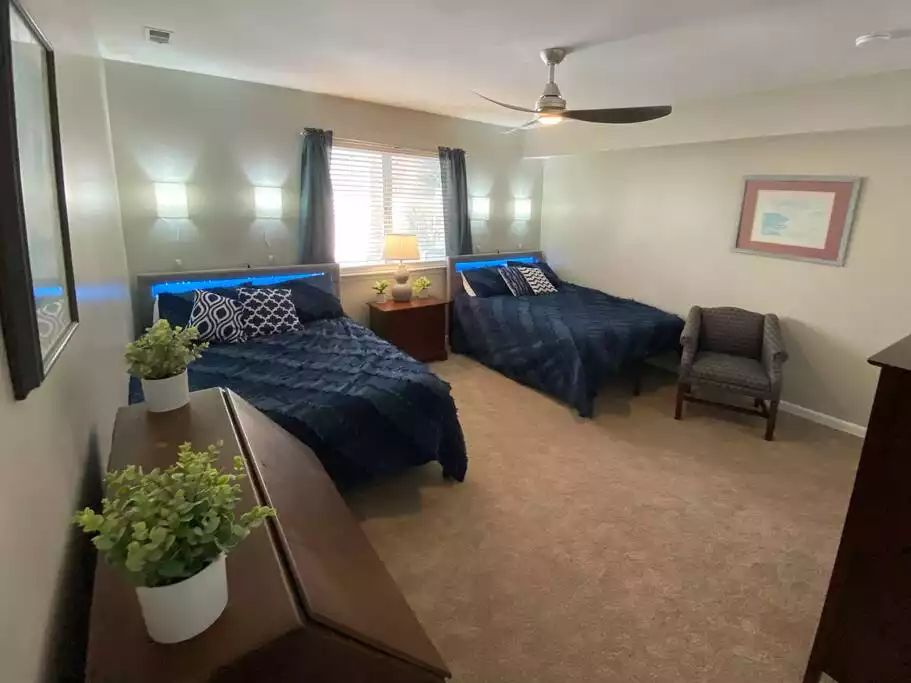 Another bedroom on the ground floor has two double beds Another bedroom on the ground floor has two double beds - Croatan Beach - Big Kitchen, Hot Tub, 2 Masters - Virginia Beach