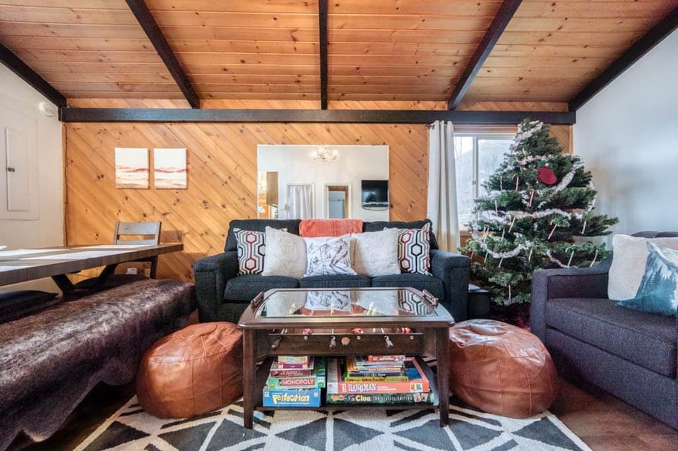 Enjoy the cozy living room decorated for the holidays.
