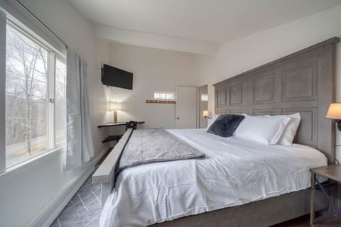 Second bedroom on the second floor with king bed. 