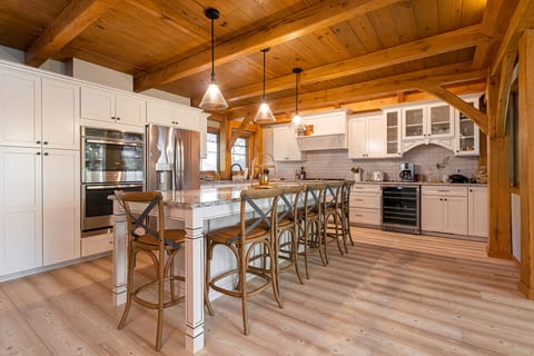 Spacious, fully equipped kitchen with bar seating