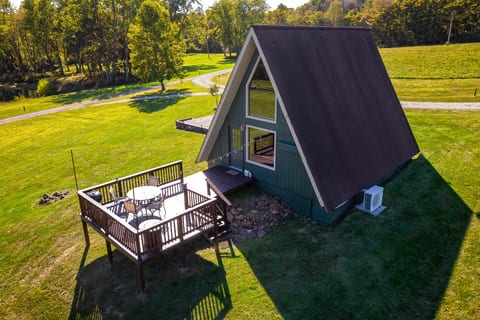 Deck with table and chairs plus a grill