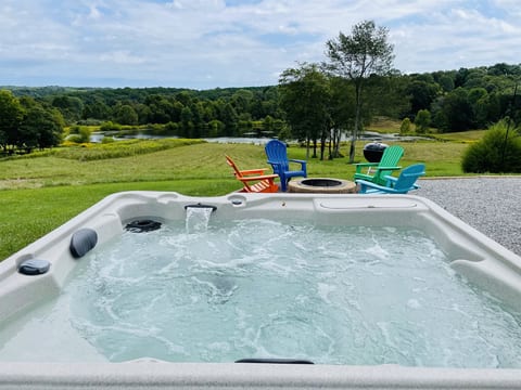 Hot tub and fire pit with seating