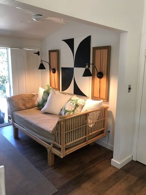 Bonus room has daybed and curtain for privacy