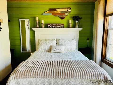 Cozy bed nestled in nook area