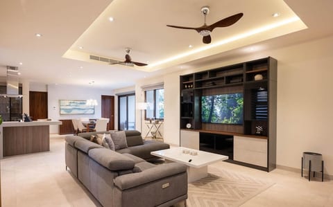 Sun-filled living room with boutique hotel vibes, designer touches, and a seamless indoor-outdoor feel — perfect for relaxing after a day exploring Puerto Vallarta’s Culinary District.