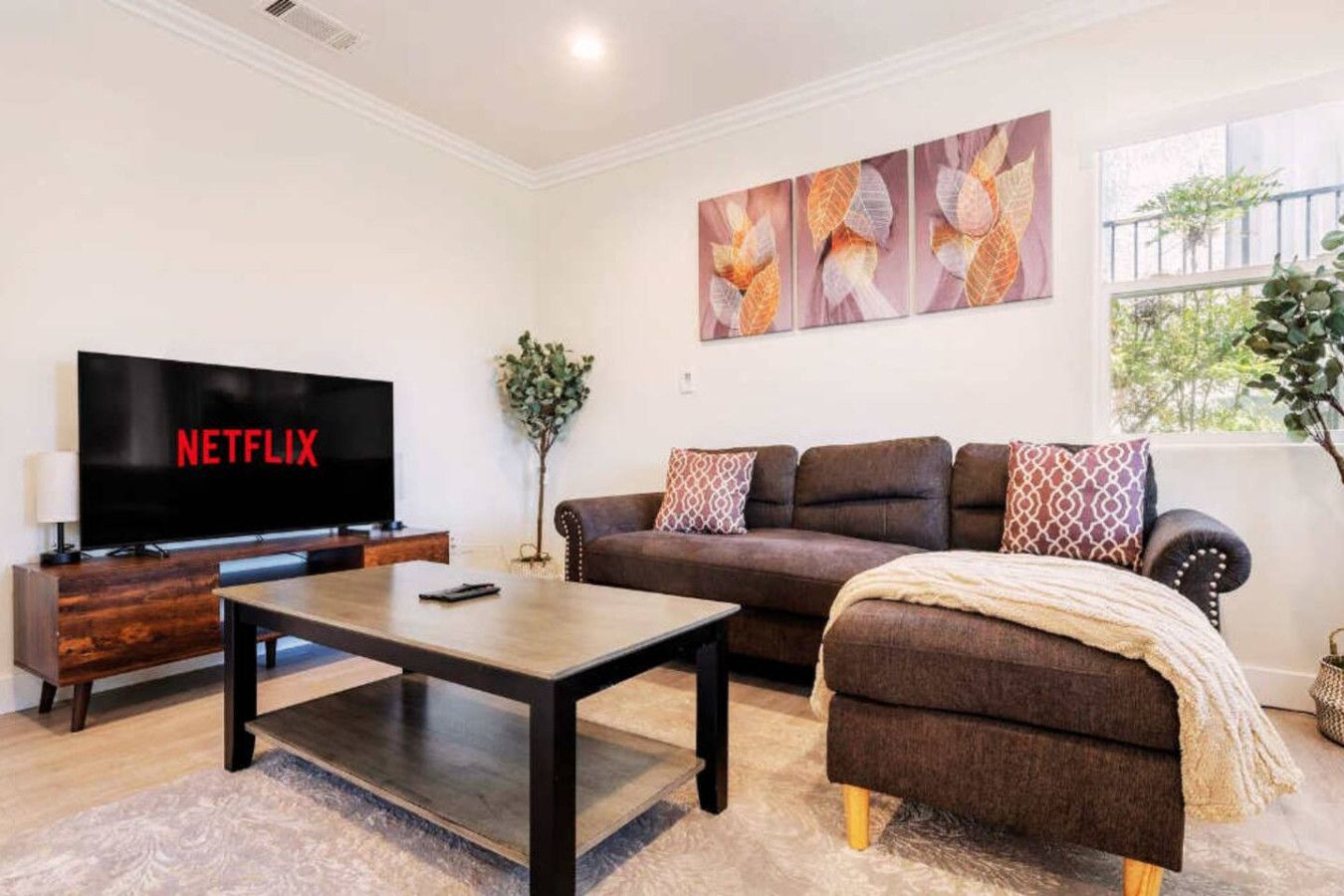 A comfortable common space included in the home (not separately listed but implied in the full-home rental). Guests can relax here, watch TV, and enjoy a quiet stay. The whole space is designed to be family-friendly and welcoming.