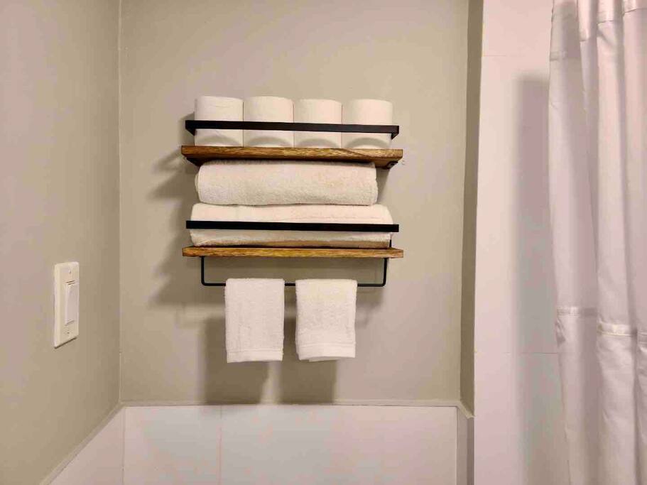 Clean white towels await every guest. - Stylish East Village Studio - New York