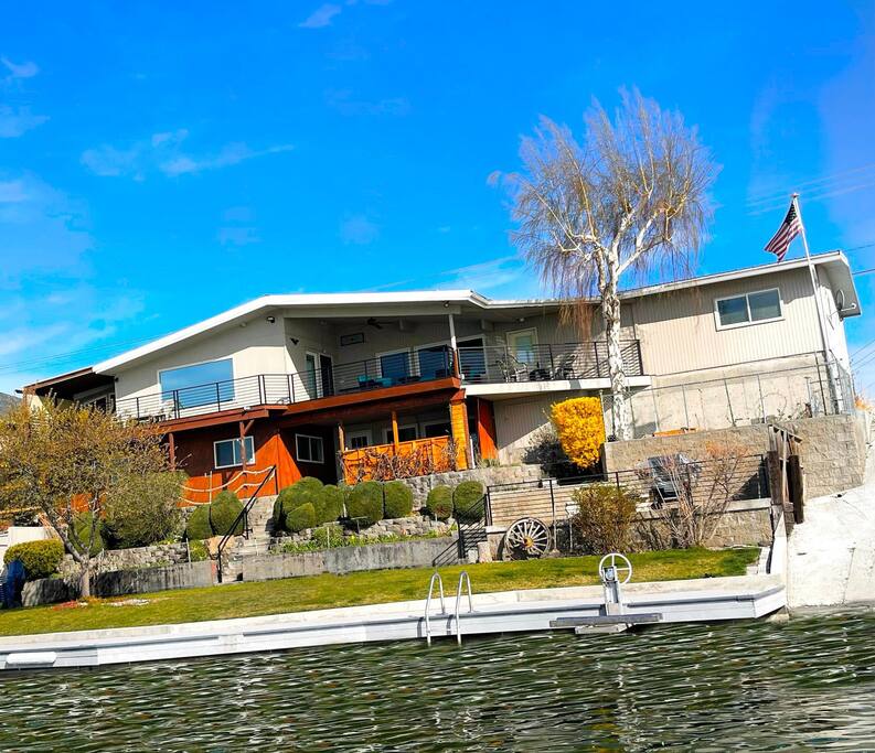 View of home from lake in early spring - Closer to the Sun Lake House - Moses Lake