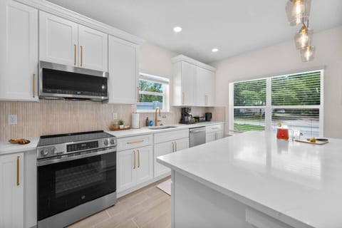 Enjoy a complete kitchen with everything you need to cook — electric stove, Ninja coffee maker, pots, pans, utensils, and a wide variety of tools to make meal prep easy.
