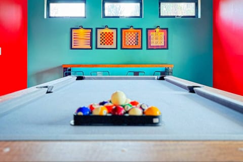 Game on! This playful space brings together billiards, board games, and bright energy for all ages.