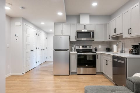 Bright modern kitchen with stainless appliances and ample cabinet space