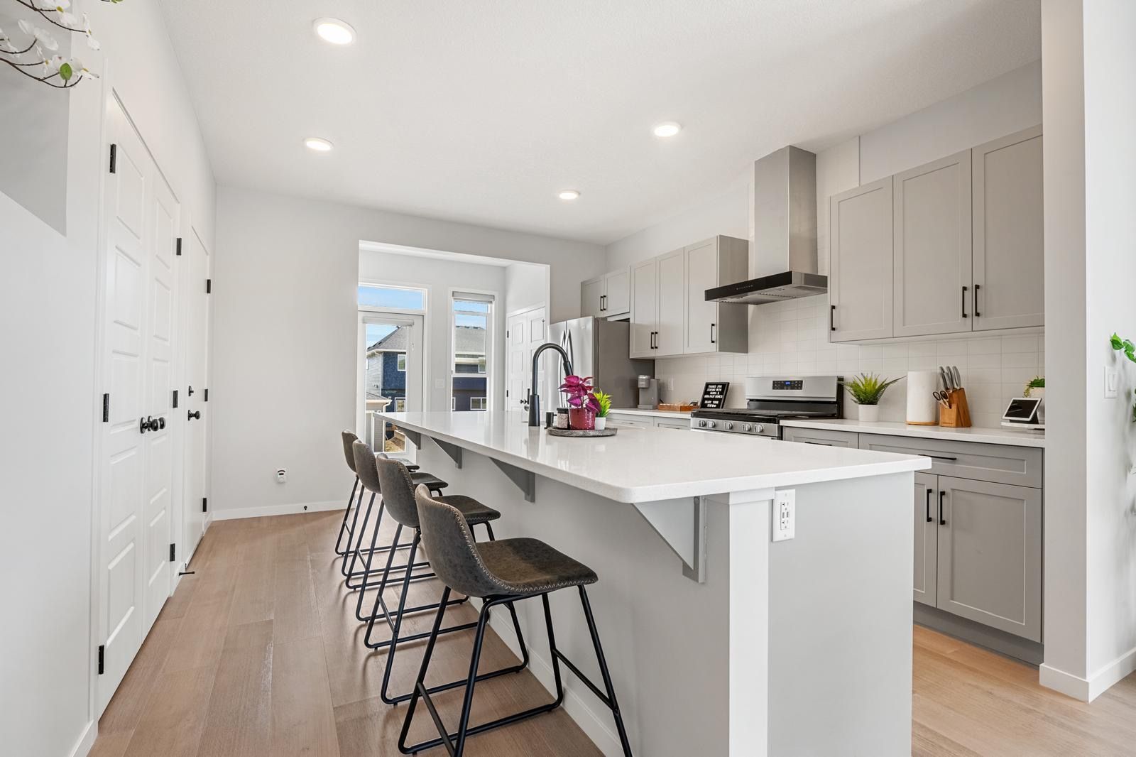 Bright modern kitchen with large island seating for four