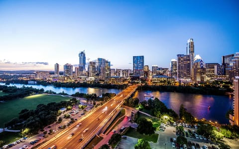 Stunning skyline and river views from high-rise at dusk