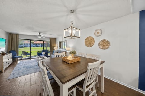Large high-top dining table with comfortable seating for 6