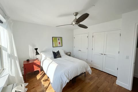 Another angle of the bedroom. The fan is great! Lots of closet space.