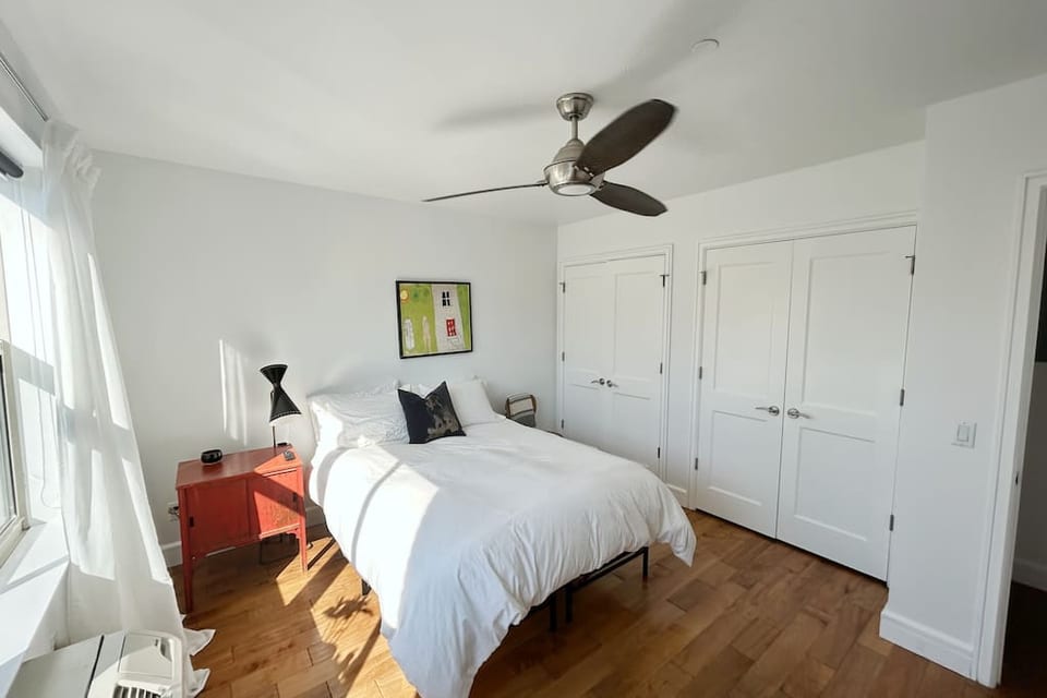 Another angle of the bedroom. The fan is great! Lots of closet space.