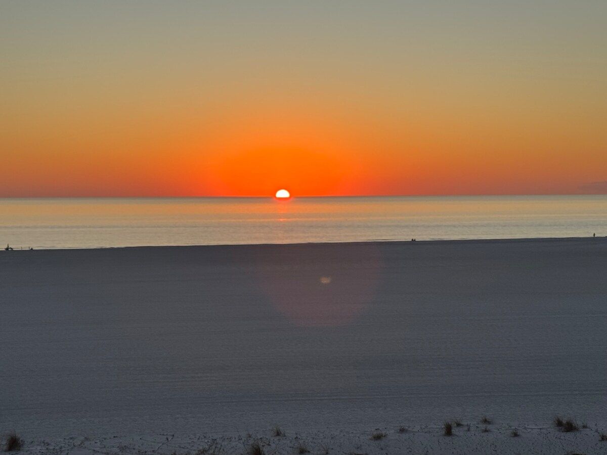 Unobstructed sunset views from our 36 foot long balcony accessible from all rooms.