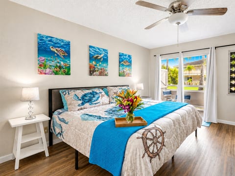 Wake up to tropical light, peaceful garden views, and a bedroom designed to feel relaxed, fresh, and unmistakably Kauai.