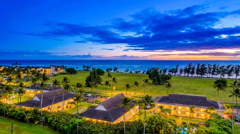 Evenings here are magic — golden lights, ocean air, and sunset skies create the perfect end to a Kauai day.