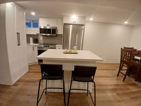 Kitchen with an island and eating area