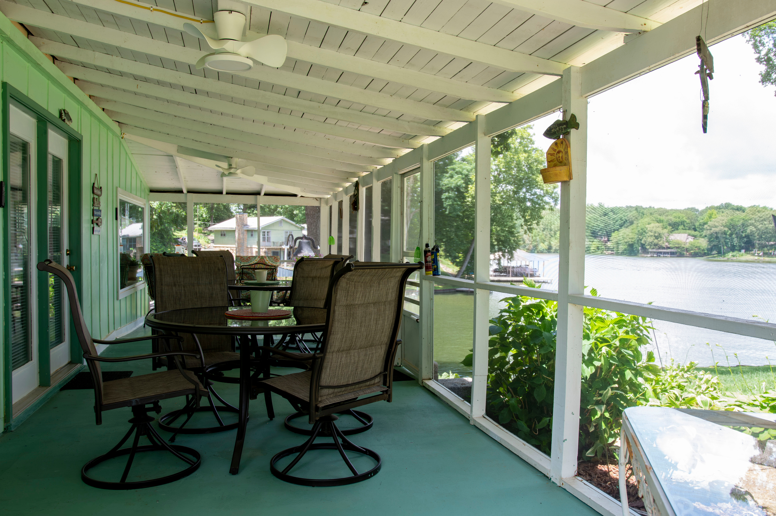View from full screened porch. Seating for 12 with ceiling fans.