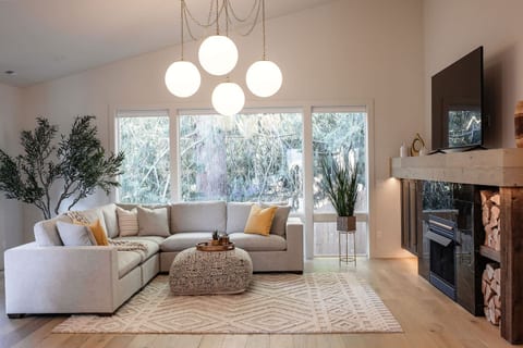 Spacious living room with plenty of room for movie nights, storytelling, and making memories together. A cozy spot to relax, laugh, and enjoy time