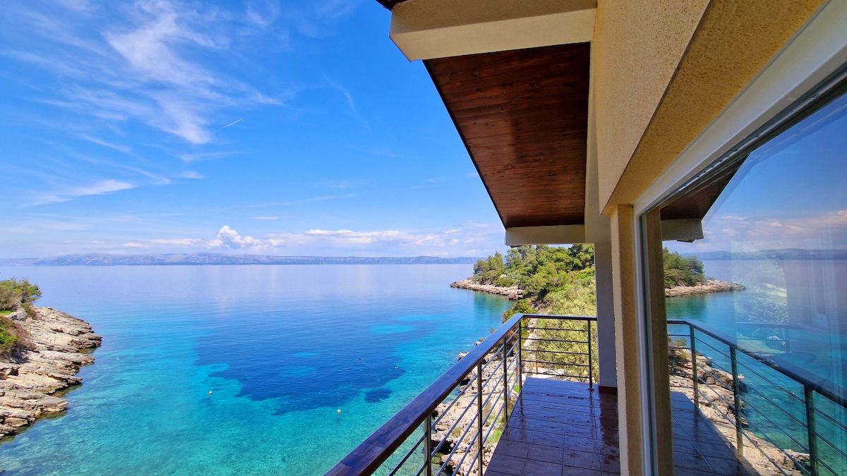 Remote beach house, just above the sea. image 1